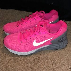 Pink nike running shoes